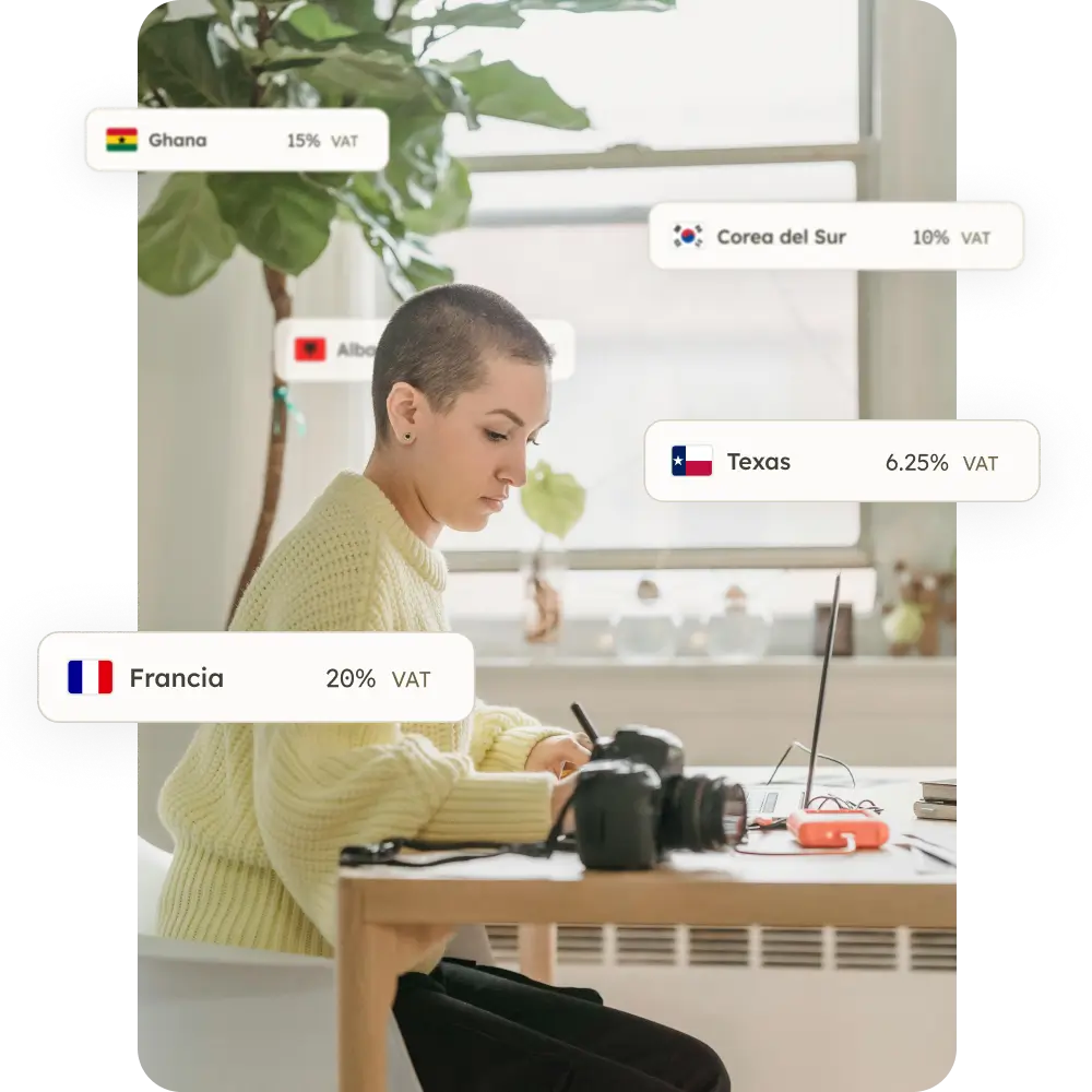 Photo of a freelance surrounded by worldwide VAT bubbles