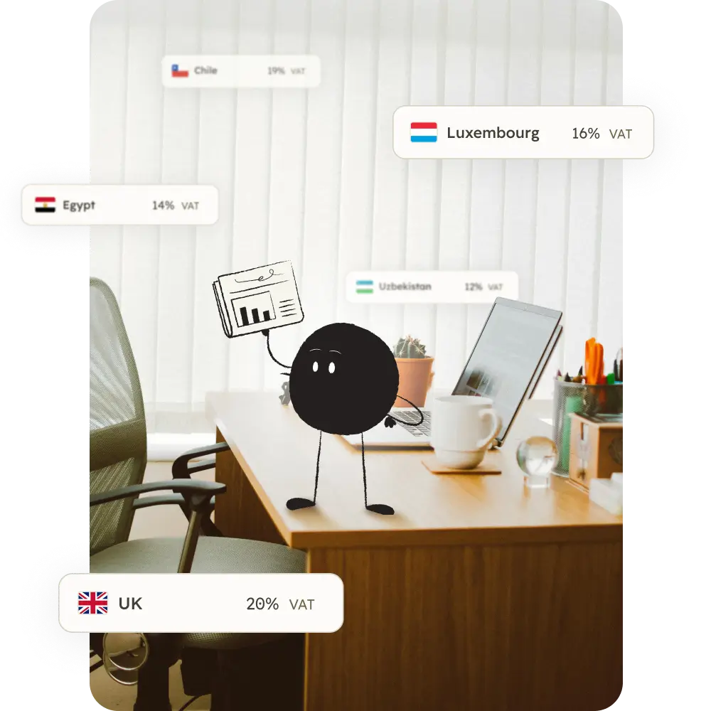 Photo of a desk with Qoodle on top with VAT bubbles around it