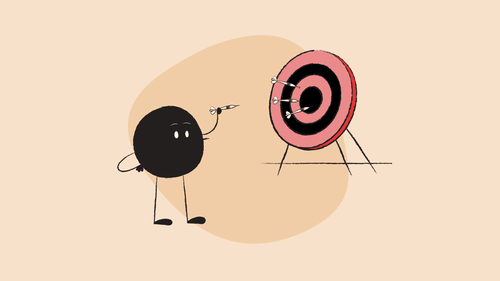 Qoodle throwing darts at a dartboard